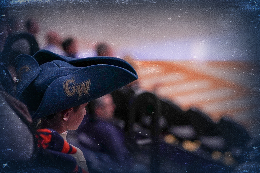 Child wearing GW tricorn hat